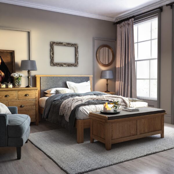 Burford Bed Frame Fabric Headboard with a wooden frame - rest of frame in a wooden finish
